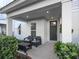 Cozy front porch with seating offers a relaxing outdoor space at 115 E Concord St # 3, Orlando, FL 32801