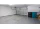 Clean, spacious garage with epoxy flooring and ample storage space at 115 E Concord St # 3, Orlando, FL 32801