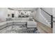 Open-concept living room adjacent to the kitchen with modern decor and comfortable seating at 115 E Concord St # 3, Orlando, FL 32801