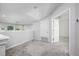 Cozy loft area with neutral decor and an open doorway to an adjacent room at 115 E Concord St # 3, Orlando, FL 32801