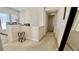 Upstairs hallway with neutral paint and carpet, natural light and decorative touches at 11725 Sprawling Oak Dr, Windermere, FL 34786