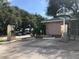 Car wash area with vacuum station and parking spaces amidst a lush green setting at 120 Blue Point Way # 360, Altamonte Springs, FL 32701