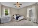 Neutral bedroom featuring a gray accent pillow and a comfortable bean bag chair at 13812 Magnolia Glen Cir, Orlando, FL 32828