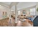 Bright and airy living room featuring hardwood floors and open floor plan at 13812 Magnolia Glen Cir, Orlando, FL 32828