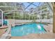 Private screened pool and spa area with waterslide at 13812 Magnolia Glen Cir, Orlando, FL 32828