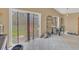 Bright area with sliding glass doors, a dining area and a view of the backyard at 1525 Rivers Edge Dr, Orlando, FL 32825