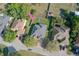 Aerial view of a home with a lush green backyard at 1924 Eloise Cove Dr, Winter Haven, FL 33884