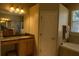 Bathroom with vanity and ample lighting, separate soaking tub at 1924 Eloise Cove Dr, Winter Haven, FL 33884