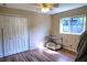 Bedroom includes standard closet, window for natural light and ceiling fan at 1924 Eloise Cove Dr, Winter Haven, FL 33884