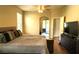 Serene main bedroom featuring a sliding glass door to the outside, and an en-suite bathroom at 1924 Eloise Cove Dr, Winter Haven, FL 33884