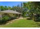 Well-maintained backyard with a patio area, perfect for outdoor dining and entertaining at 2930 Westgate Dr, Eustis, FL 32726