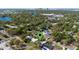 Extensive aerial view of neighborhood with many trees and a lake nearby at 3006 Northwood Blvd, Winter Park, FL 32789