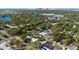 Extensive aerial view of neighborhood with many trees and a lake nearby at 3006 Northwood Blvd, Winter Park, FL 32789