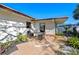 Backyard patio featuring dining set with lush, mature landscaping at 3006 Northwood Blvd, Winter Park, FL 32789