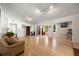 Spacious living room featuring light wood floors and large windows for natural light at 3006 Northwood Blvd, Winter Park, FL 32789