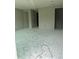 Open concept room with smooth concrete floors, showcasing the layout and design potential at 3027 Turkey Ave, Oviedo, FL 32765