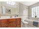 Well-maintained bathroom featuring a bath tub and neutral tile flooring with accent tiles at 323 Marjorie Blvd, Longwood, FL 32750