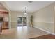 Bright dining area features tile floors and sliding glass doors opening to the backyard porch at 323 Marjorie Blvd, Longwood, FL 32750