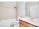 Bathroom features a tub-shower combo, large vanity, and tile flooring at 3466 Allegra Cir, St Cloud, FL 34772