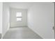 Neutral bedroom with tile floors and natural light from a window at 4032 Redbridge Loop, Davenport, FL 33837