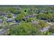 Aerial view of a home nestled in a lush, green neighborhood with mature trees at 412 N Boyd St, Winter Garden, FL 34787