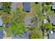 Overhead view of a home with mature trees in a suburban neighborhood at 412 N Boyd St, Winter Garden, FL 34787