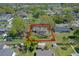 Aerial view outlining the property lines of the house within a tree-filled neighborhood at 412 N Boyd St, Winter Garden, FL 34787