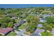 Aerial view of a home nestled in a lush, green neighborhood, near a body of water at 412 N Boyd St, Winter Garden, FL 34787