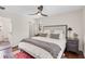 Tranquil main bedroom featuring a comfortable bed, stylish nightstands, and an ensuite bathroom at 4457 Anson Ln, Orlando, FL 32814