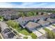 Aerial view of townhomes and surrounding neighborhood at 502 Rainbow Springs Loop, Groveland, FL 34736