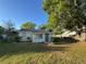 Charming single-story home with green front door and well-maintained landscaping, inviting curb appeal at 508 W Crescent Dr, Lakeland, FL 33805