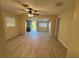 Living room boasts wood-look floors, natural light and an open floor plan at 508 W Crescent Dr, Lakeland, FL 33805