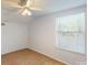 Comfortable bedroom with bright natural light, ceiling fan and carpet flooring at 5132 Luna Negra Dr, Orlando, FL 32811