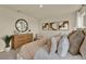 Comfortable bedroom featuring a round mirror, decorative wall art, and a serene color palette at 5233 Marshelder St, Apopka, FL 32712