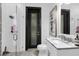 Modern bathroom with stone flooring and glass shower at 6030 Greatwater Dr, Windermere, FL 34786