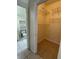 Walk-in closet has wire shelving and is located off the bathroom at 7109 Yacht Basin Ave # 430, Orlando, FL 32835