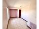 Bedroom with tile flooring, closet and natural light at 716 Caribou Dr, Kissimmee, FL 34759