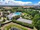 A full aerial view of a community pool and recreational facilities at 824 Longboat Dr, Davenport, FL 33896