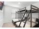 Bedroom featuring bunkbeds, carpet floors and a window at 824 Longboat Dr, Davenport, FL 33896