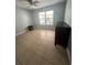 Bright bedroom with tile floors and ample natural light at 100 Huntswood Ct, Longwood, FL 32750