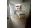 Modest bedroom with tile flooring, ceiling fan, and a single bed at 100 Huntswood Ct, Longwood, FL 32750