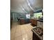 Modern kitchen featuring stainless steel appliances, granite countertops, and tile floors at 100 Huntswood Ct, Longwood, FL 32750