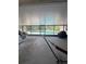 Screened in patio provides a view of the in-ground pool surrounded by lush greenery at 100 Huntswood Ct, Longwood, FL 32750