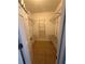 Walk-in closet with wire shelving, and tile flooring at 100 Huntswood Ct, Longwood, FL 32750