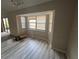 Dining room featuring bay window and sliding glass doors, filled with natural light at 1060 Walt Williams Rd, Lakeland, FL 33809