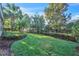 Lush backyard with healthy lawn and landscaping at 11754 Barletta Dr, Orlando, FL 32827