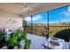 Relaxing screened lanai featuring a ceiling fan, plants, and view of trees and sky at 1290 Grady Ln # 20232, Davenport, FL 33896