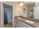 Hall bathroom featuring double sinks, shower/tub combo and neutral color palette at 1304 Spotted Sandpiper Loop, Winter Springs, FL 32708