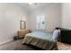 Bedroom featuring a twin bed, carpeted floor, and window with shutters, and soft neutral colors at 14090 Alafaya Oak Bnd, Orlando, FL 32828