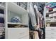 Organized walk-in closet with shelving and hanging space, offering ample storage for clothing and accessories at 150 E Robinson St # 405, Orlando, FL 32801